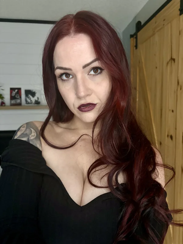Ella in a black outfit